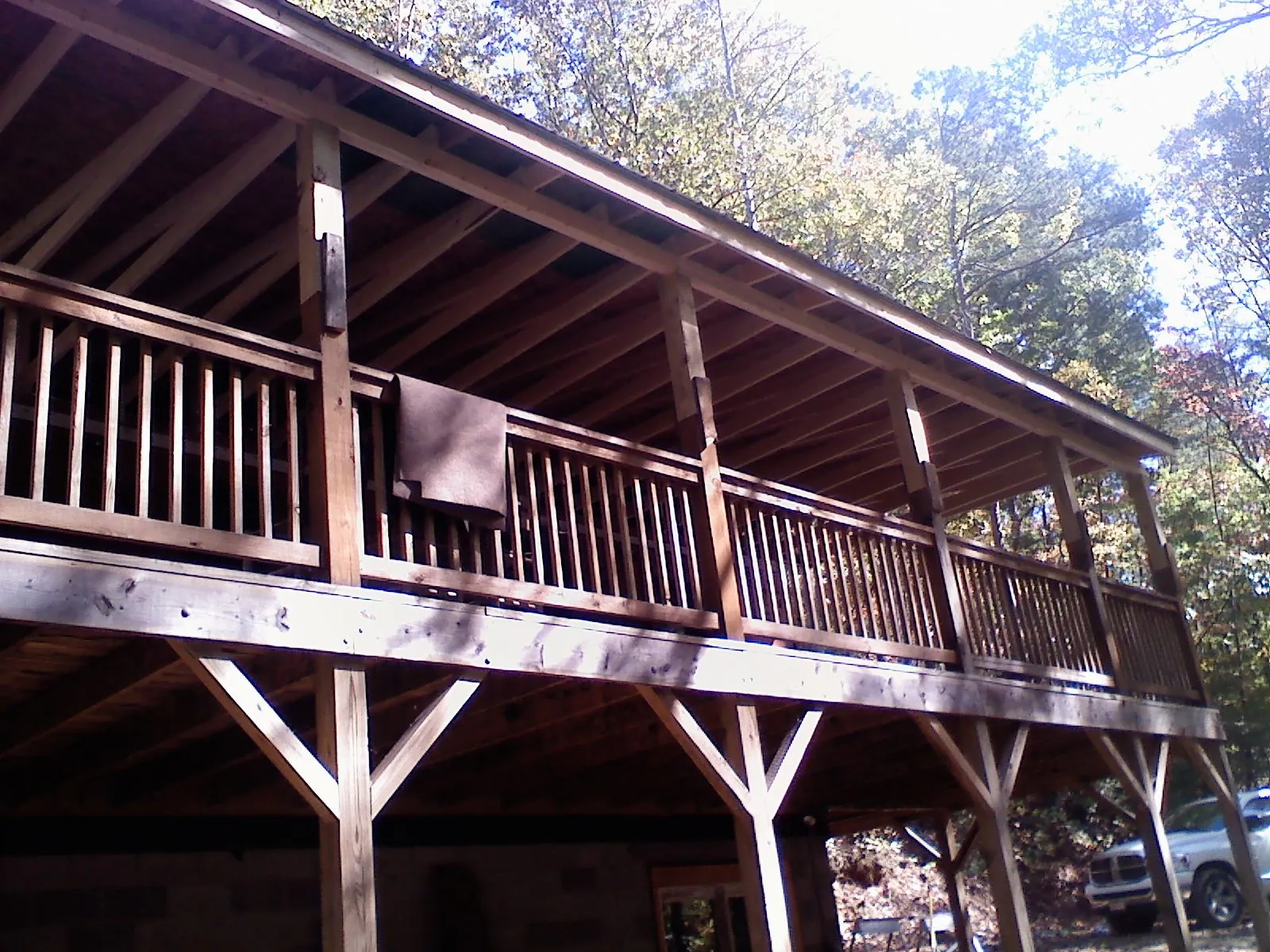Timber framing under a new elevated porch and deck — Roof Leak Repair in Hurley by Roofing Brothers
